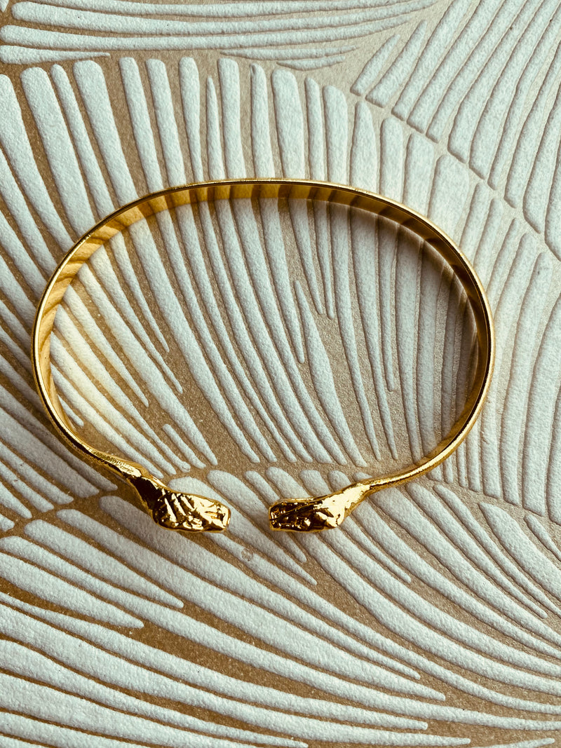 Golden snake cuff